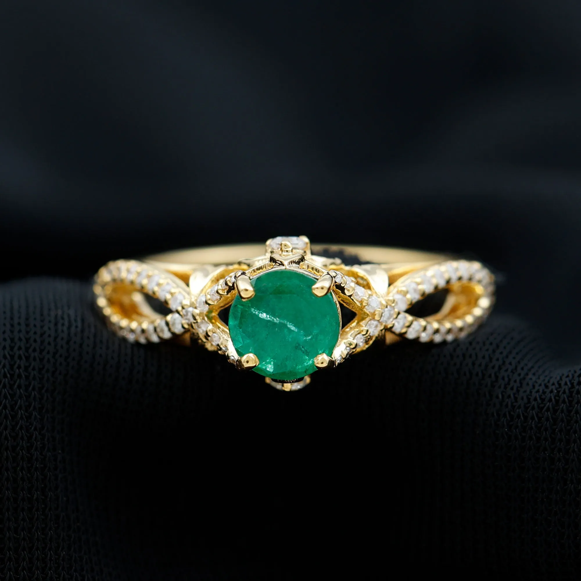 Emerald Crossover Engagement Ring with Diamond