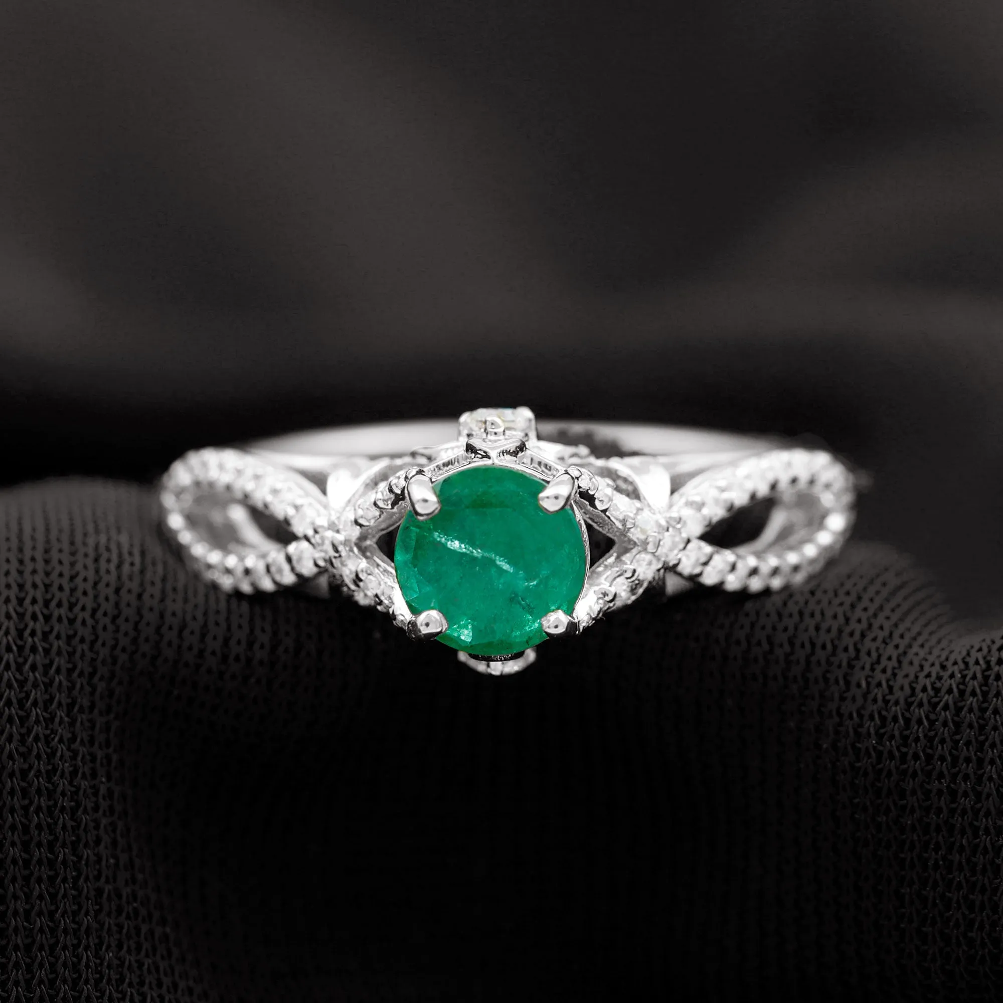 Emerald Crossover Engagement Ring with Diamond