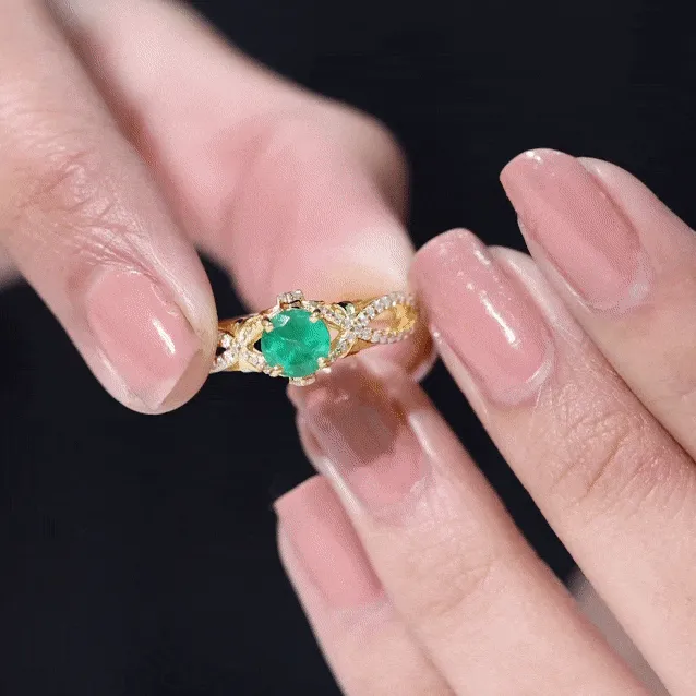 Emerald Crossover Engagement Ring with Diamond
