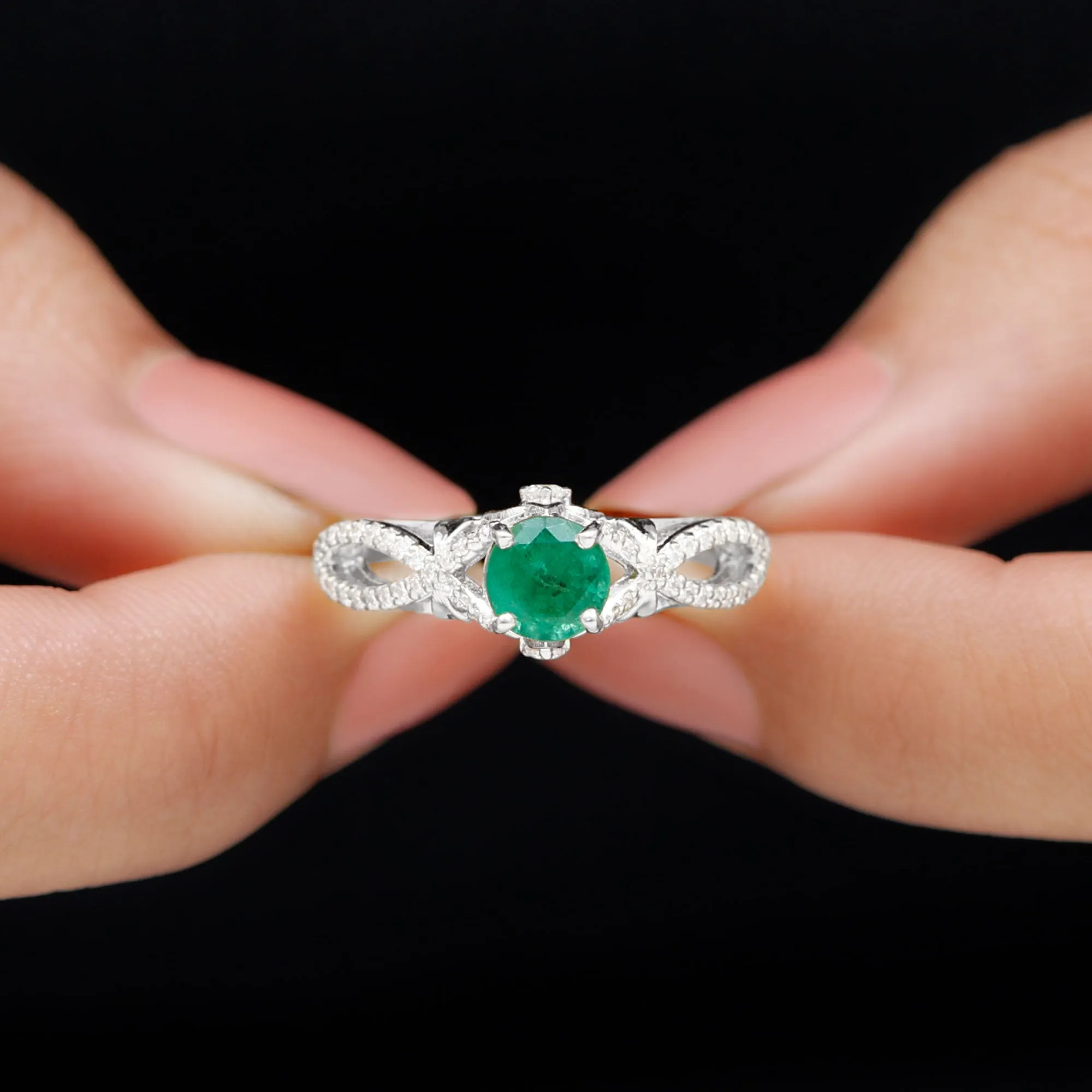 Emerald Crossover Engagement Ring with Diamond