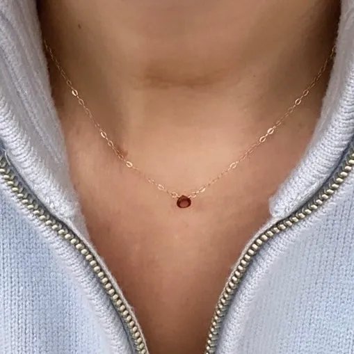 Gold Necklace with Garnet Drop