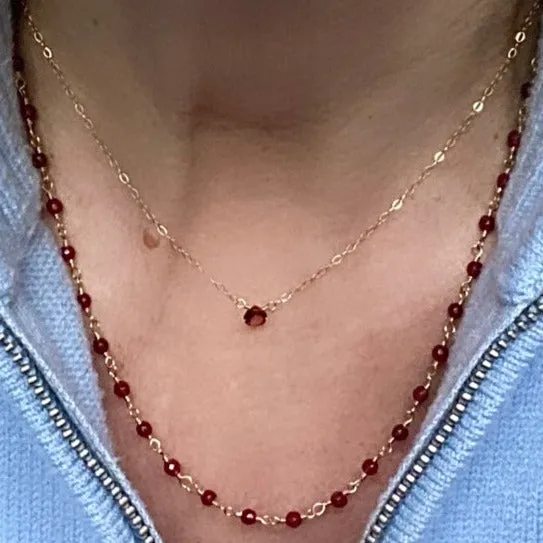 Gold Necklace with Garnet Drop