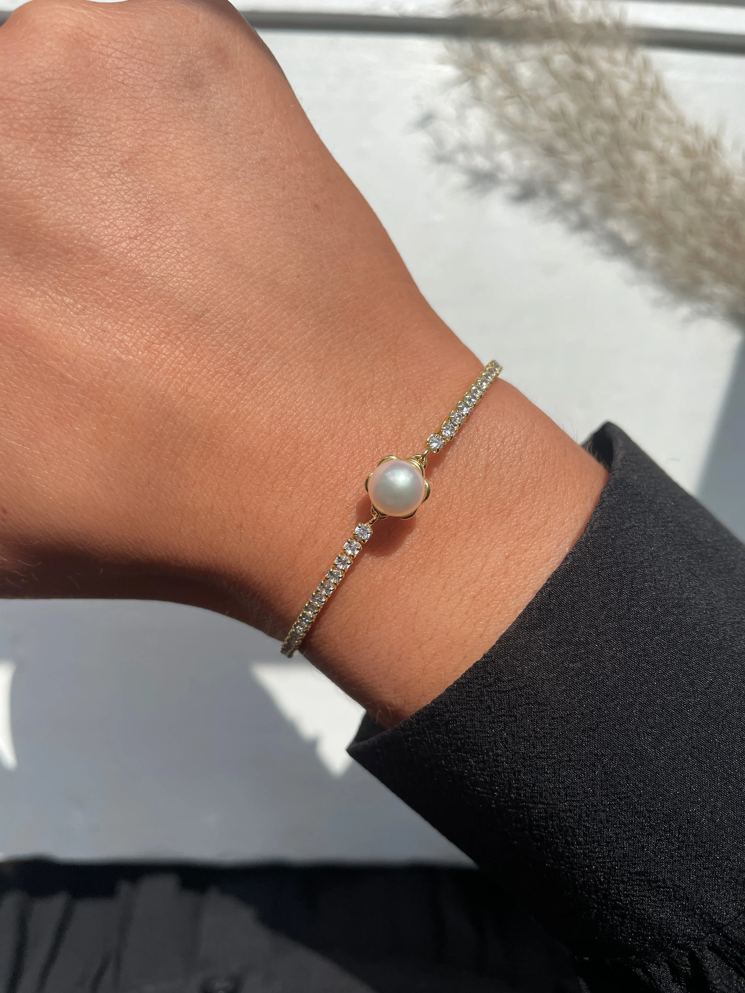 Golden Tennis Bracelet with Pearl Centre