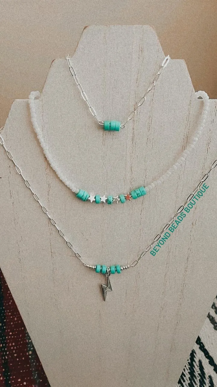 Lighting in the sky necklaces
