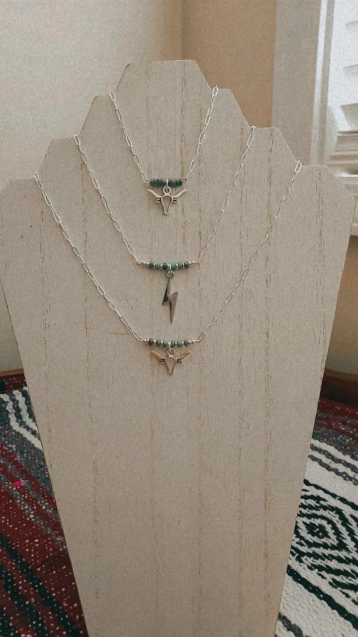 Lighting in the sky necklaces