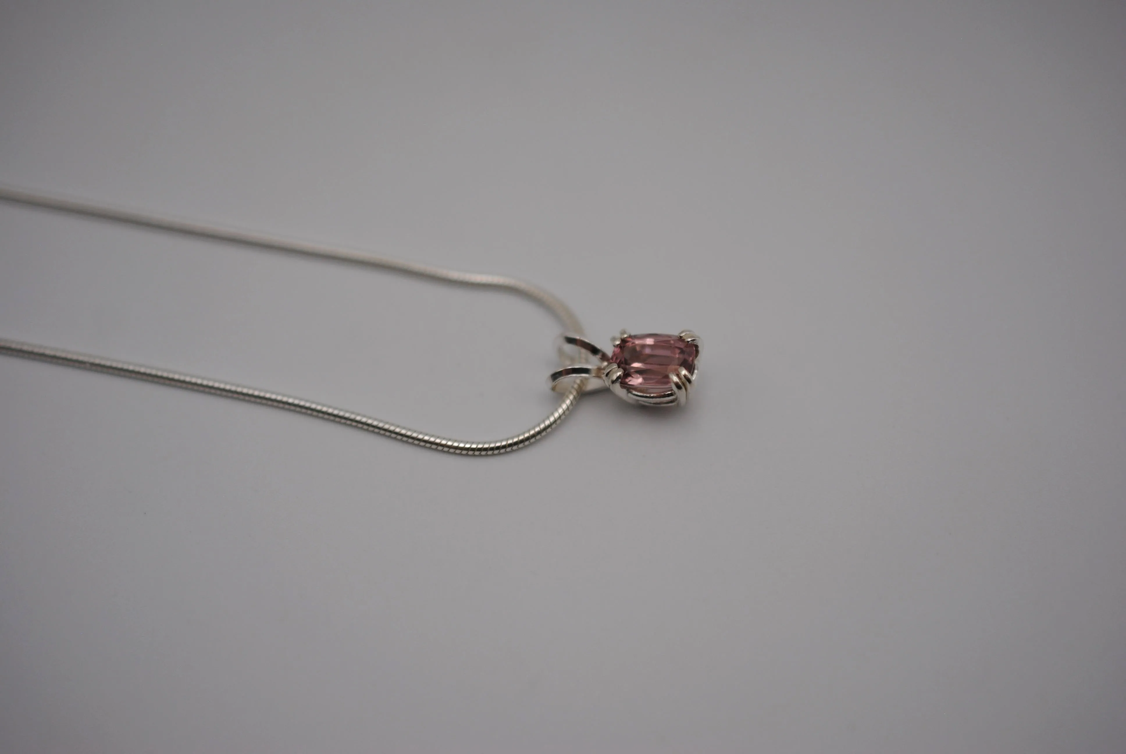 Malaia Garnet Necklace: Emerald Cut, Silver Setting, Snake Chain