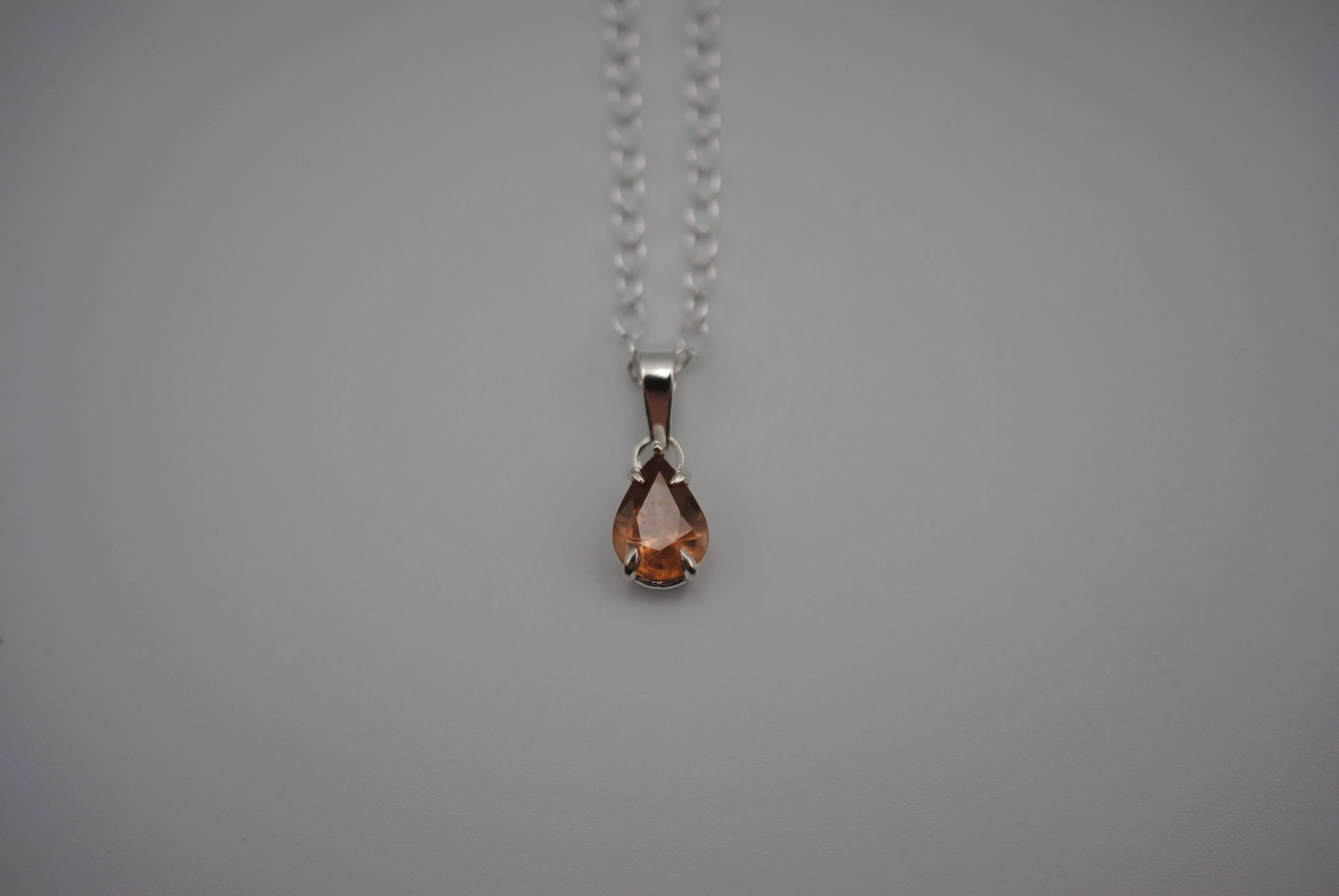 Malaia Garnet Necklace: Pear Cut, Silver Setting, Cable Chain
