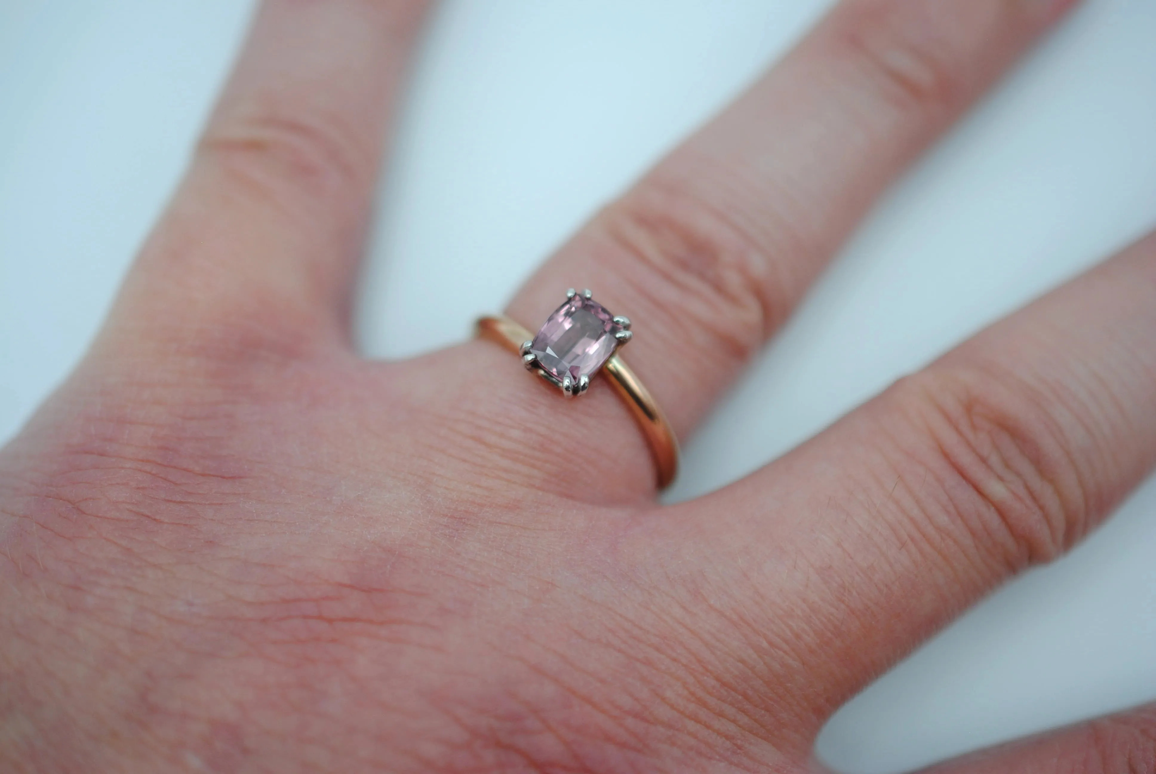 Malaia Garnet Ring: Emerald Cut, Rose Gold Bypass Band, White Gold Setting