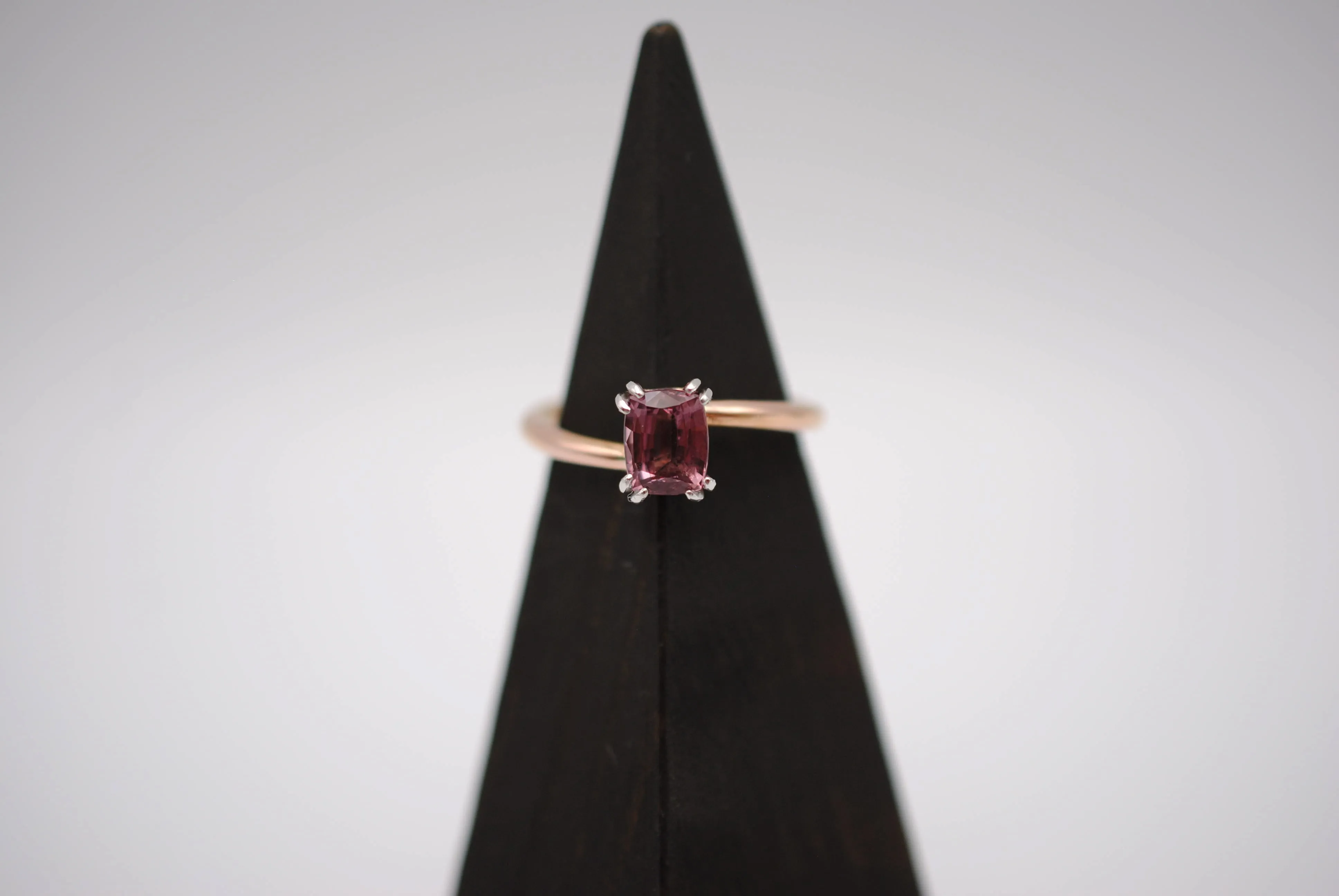 Malaia Garnet Ring: Emerald Cut, Rose Gold Bypass Band, White Gold Setting