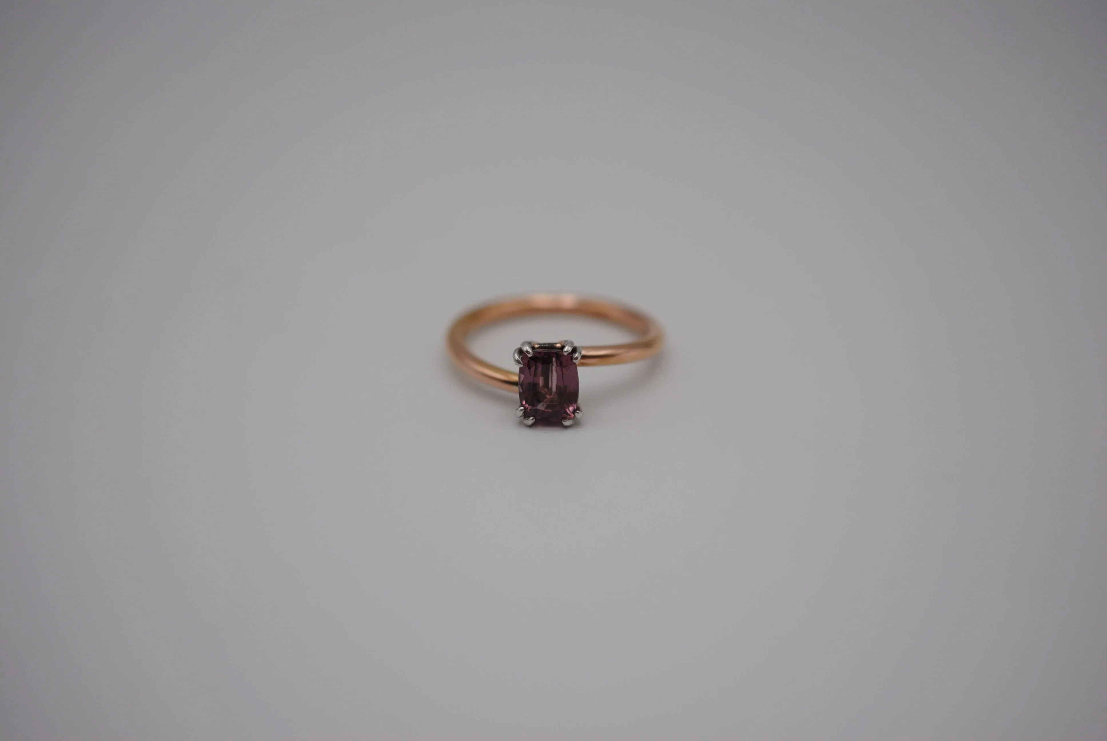 Malaia Garnet Ring: Emerald Cut, Rose Gold Bypass Band, White Gold Setting