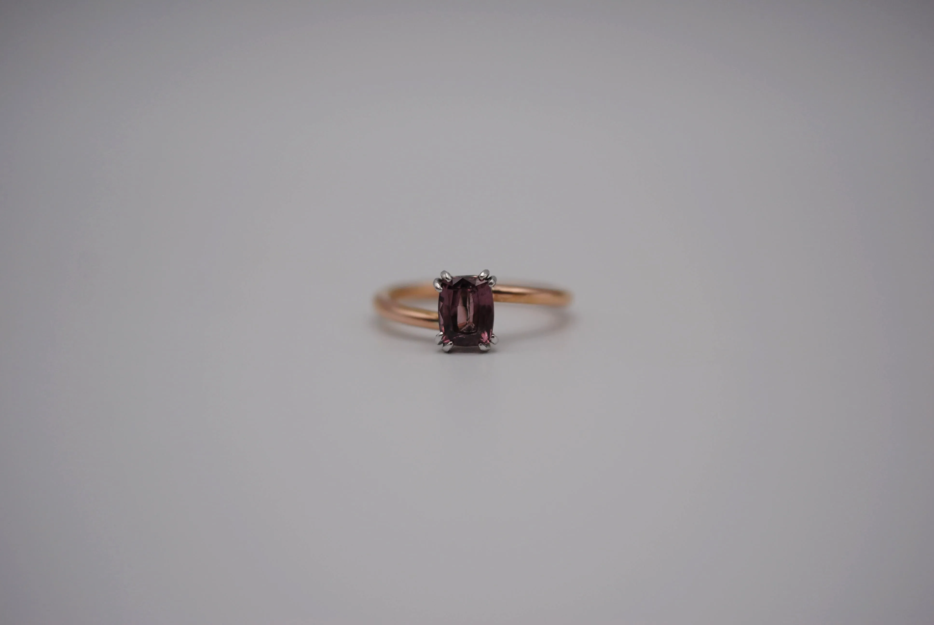 Malaia Garnet Ring: Emerald Cut, Rose Gold Bypass Band, White Gold Setting