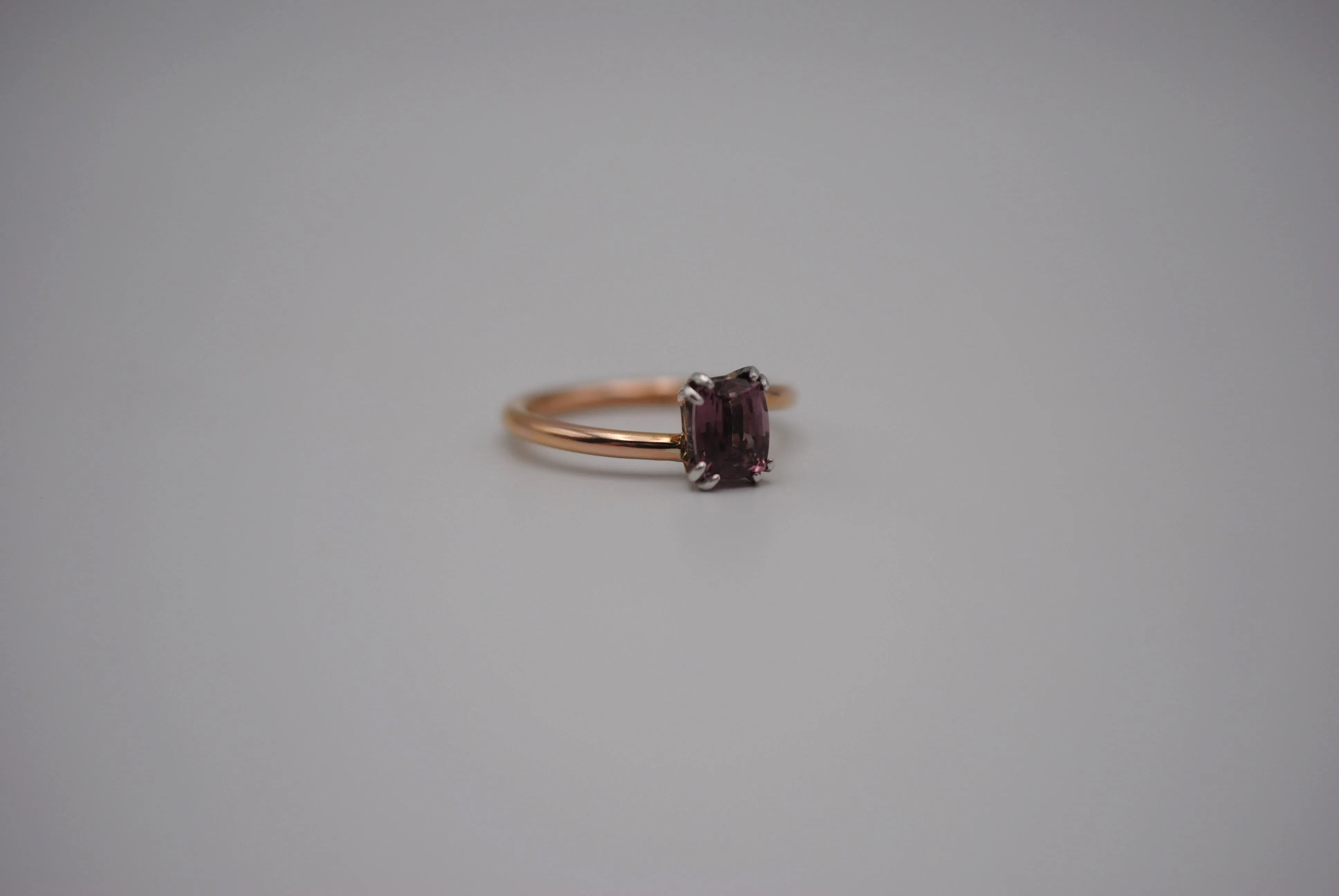 Malaia Garnet Ring: Emerald Cut, Rose Gold Bypass Band, White Gold Setting