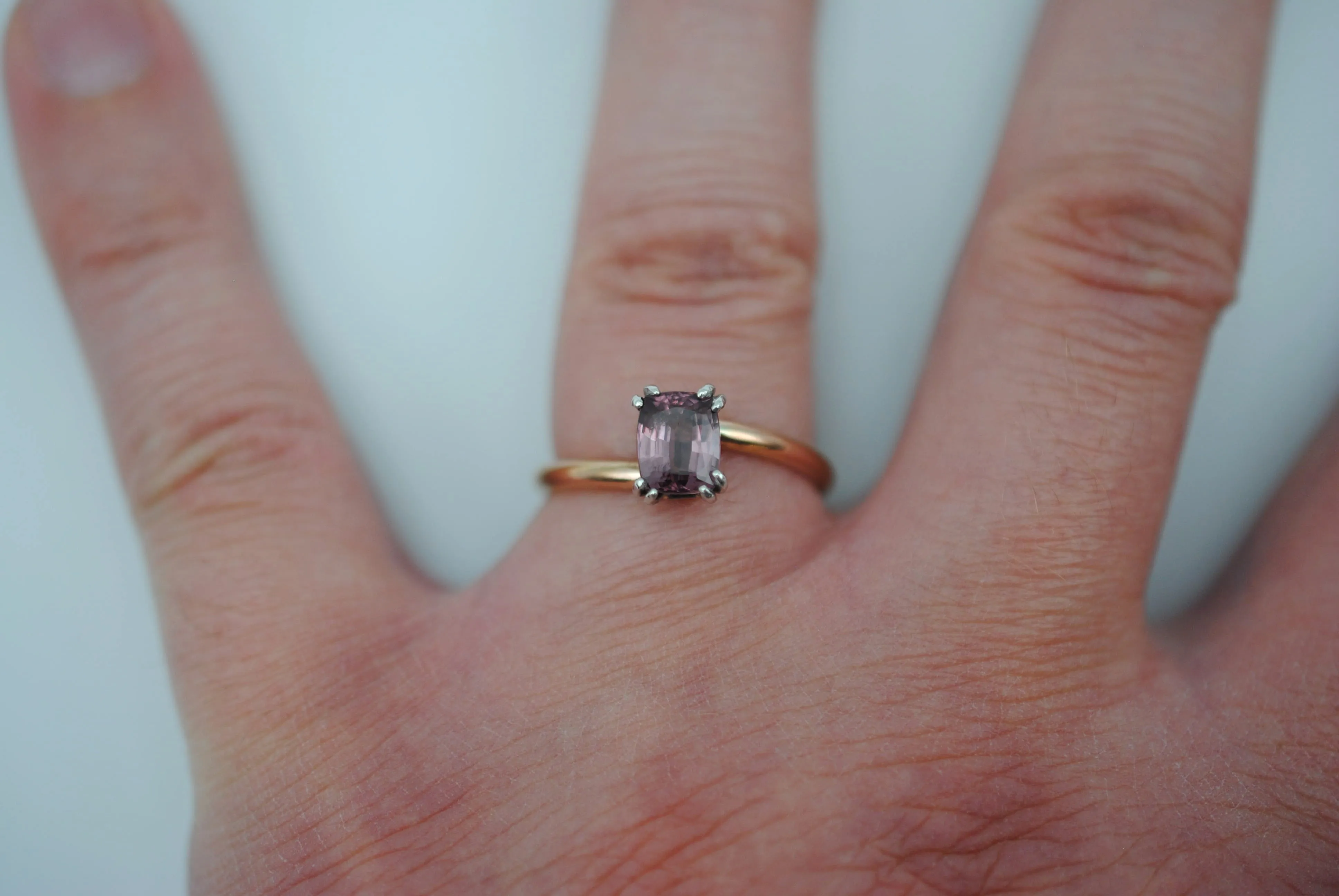 Malaia Garnet Ring: Emerald Cut, Rose Gold Bypass Band, White Gold Setting