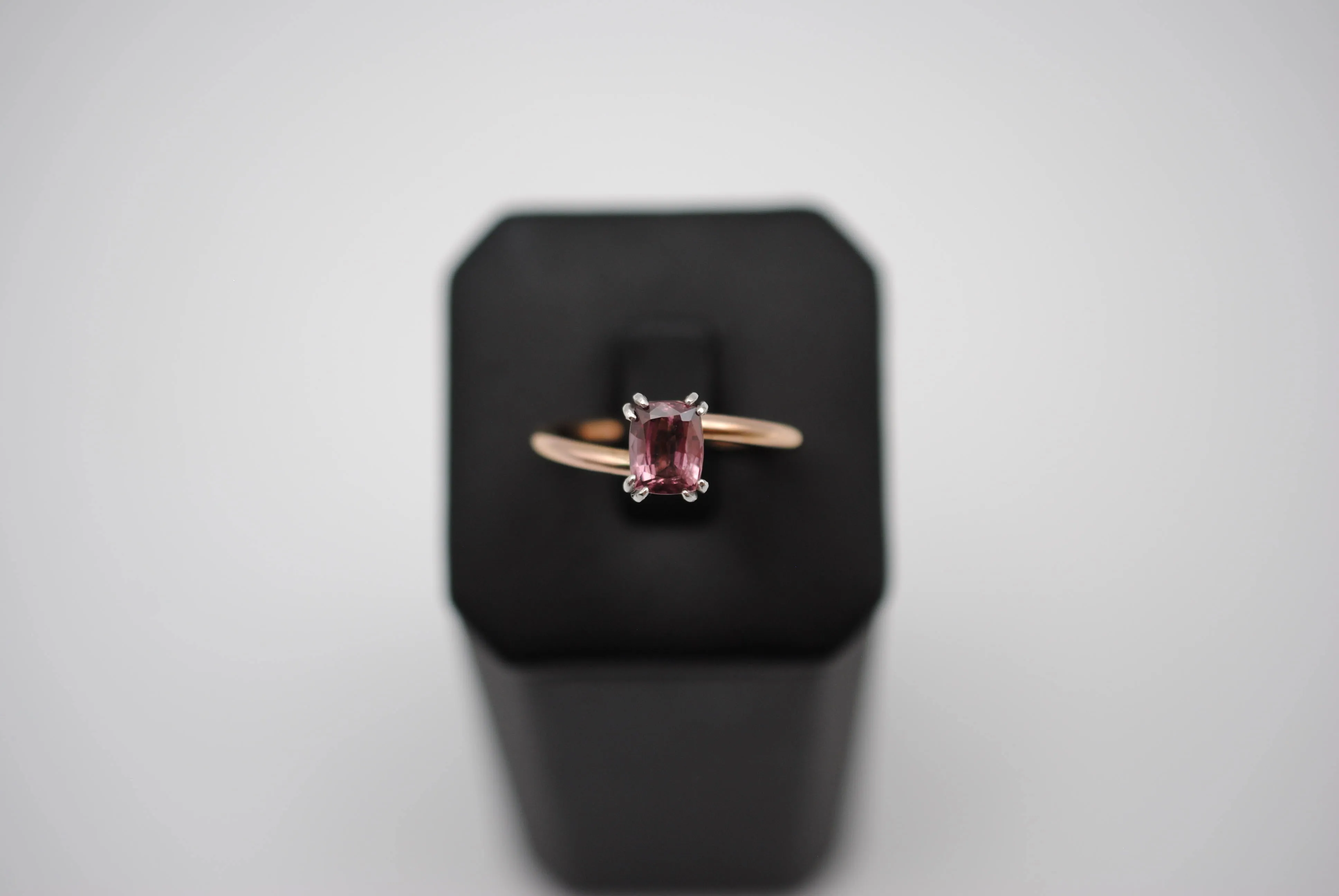 Malaia Garnet Ring: Emerald Cut, Rose Gold Bypass Band, White Gold Setting
