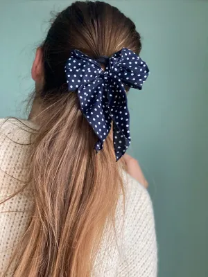 Navy blue polka dot hair bow