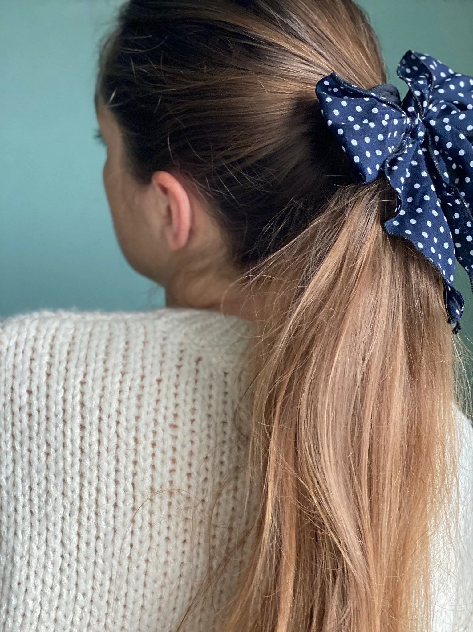 Navy blue polka dot hair bow