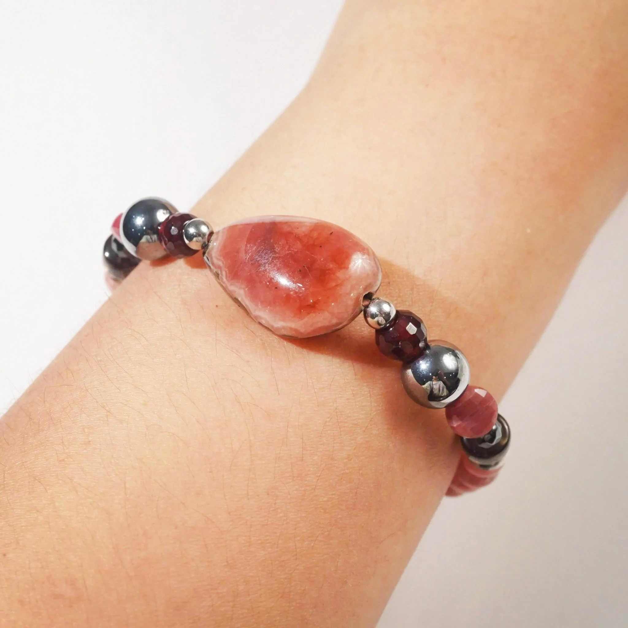 Rhodonite, Hematite, Garnet and Rhodochrosite