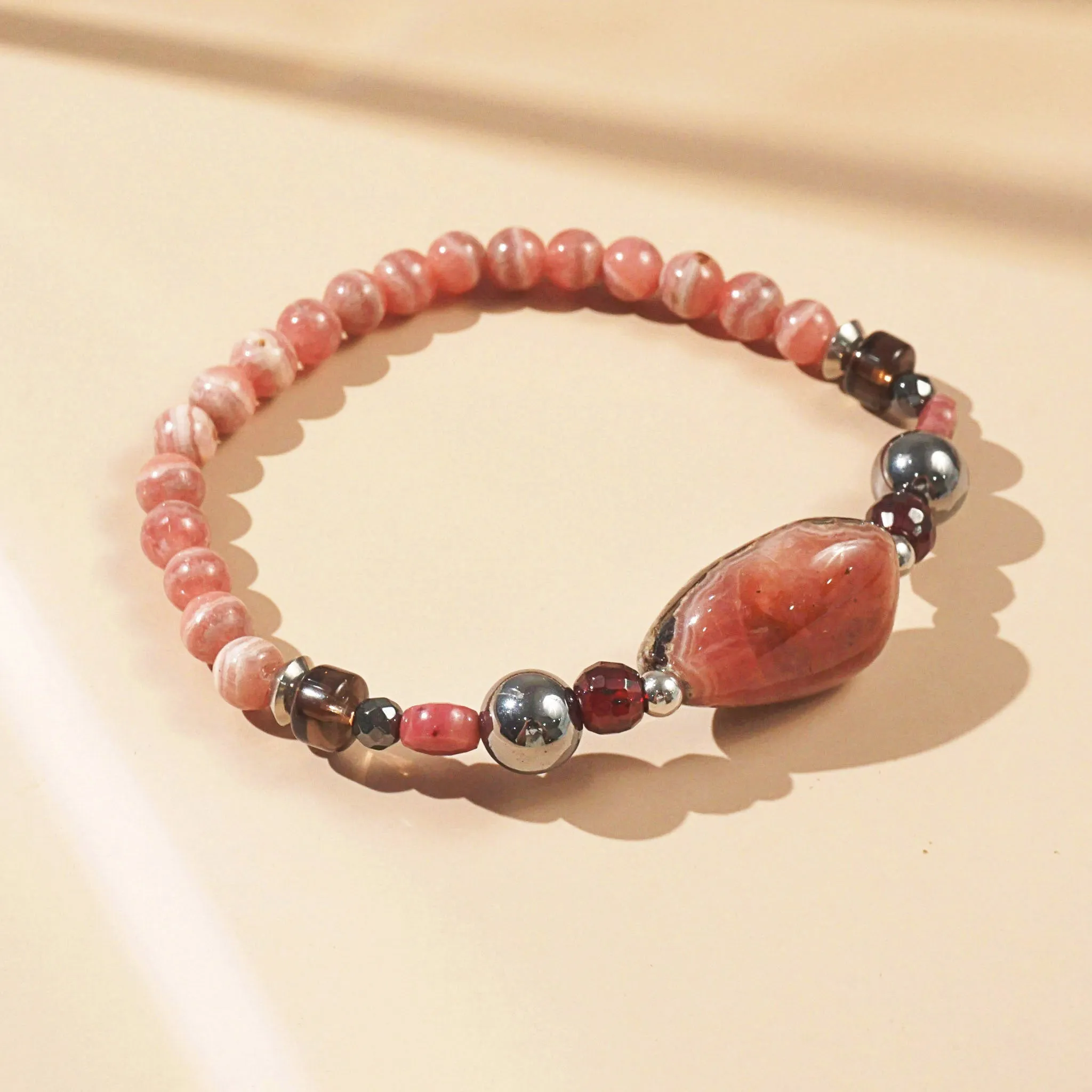 Rhodonite, Hematite, Garnet and Rhodochrosite
