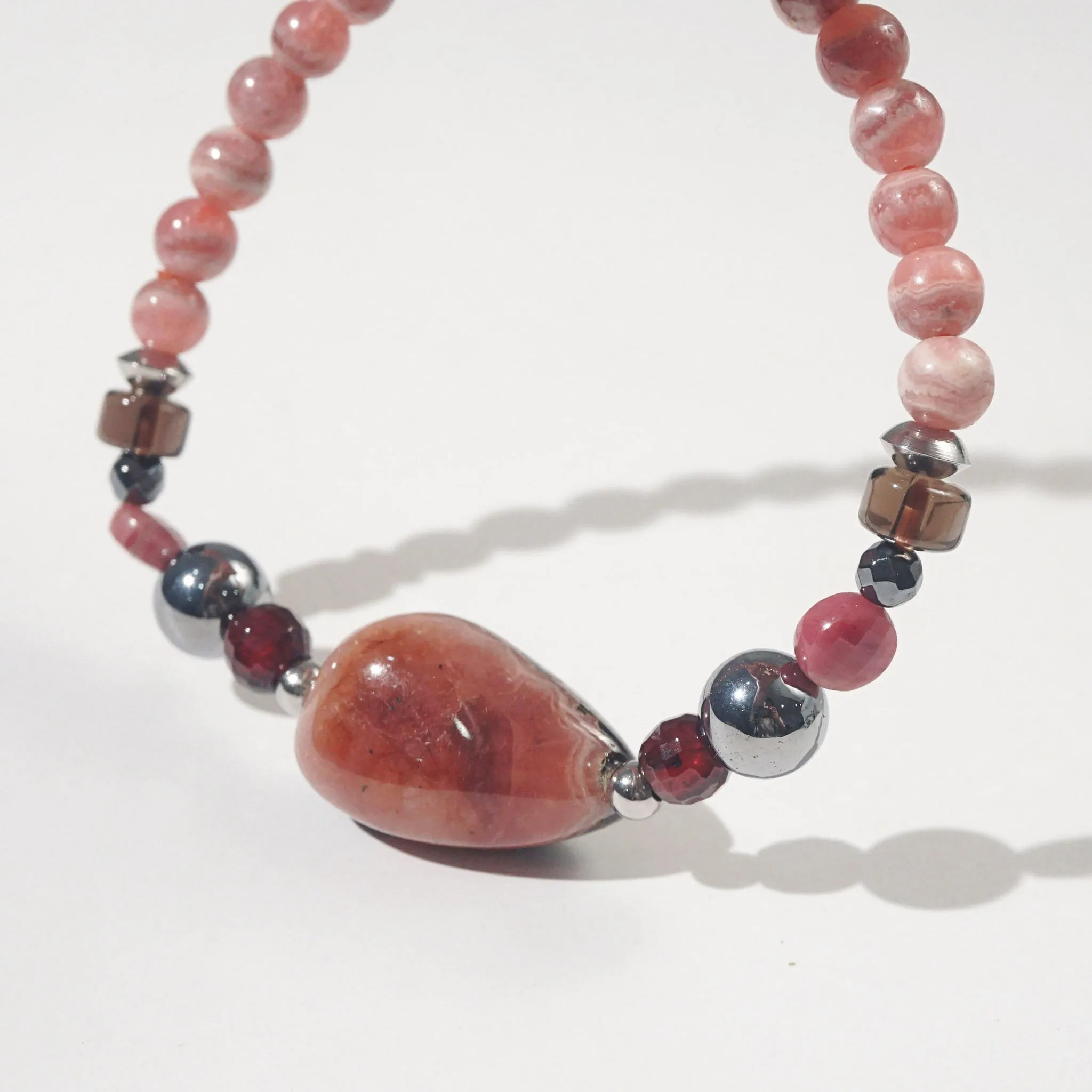 Rhodonite, Hematite, Garnet and Rhodochrosite