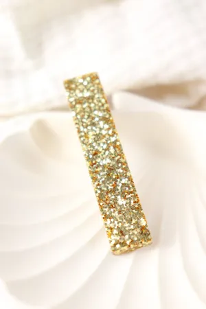 Straight hair clip with large gold sequins