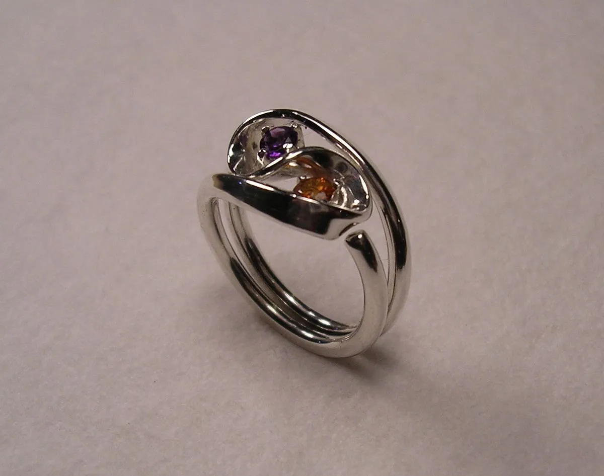 Violet Amethyst and Mandarine Garnet Set in The Two Turn Vortex Energy Rings ™ ©