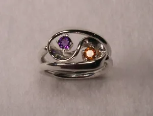 Violet Amethyst and Mandarine Garnet Set in The Two Turn Vortex Energy Rings ™ ©