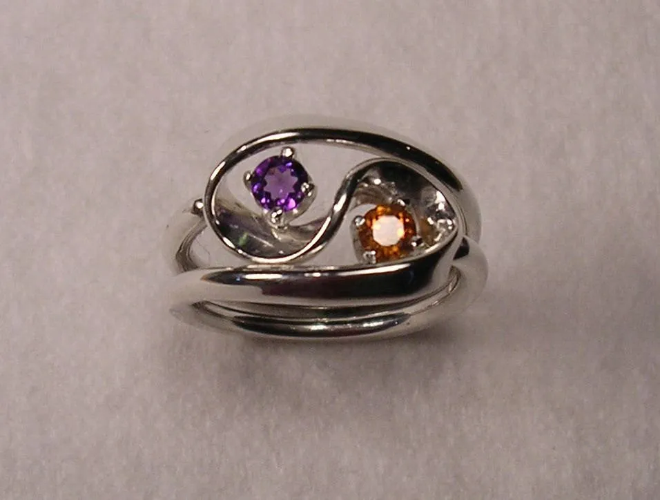 Violet Amethyst and Mandarine Garnet Set in The Two Turn Vortex Energy Rings ™ ©
