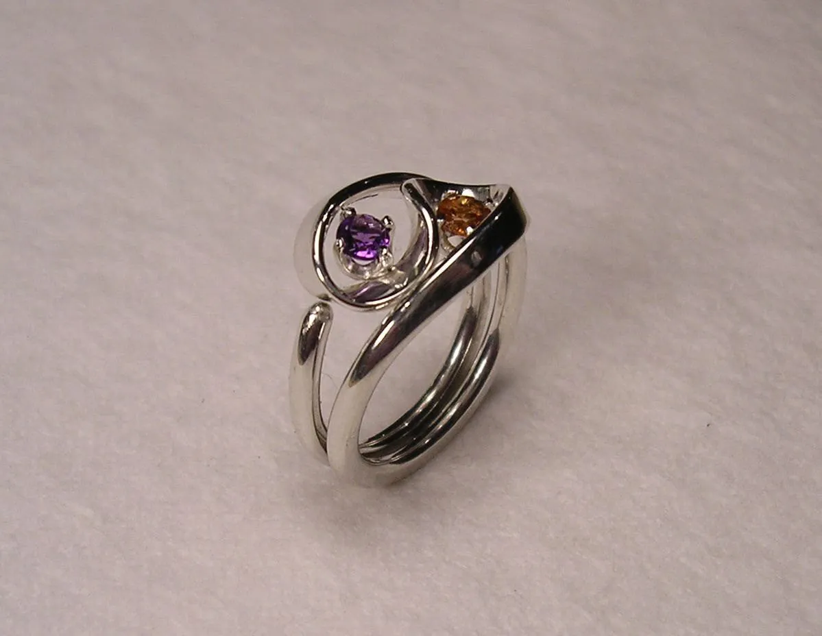 Violet Amethyst and Mandarine Garnet Set in The Two Turn Vortex Energy Rings ™ ©